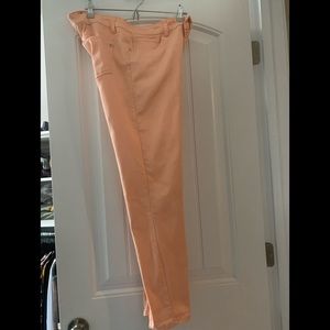 Peach colored skinny jeans